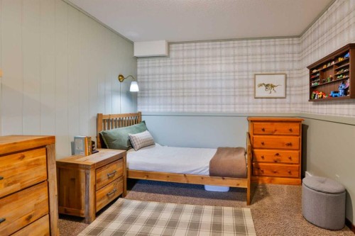 304 S 150 W, Raymond, AB - Indoor Photo Showing Bedroom