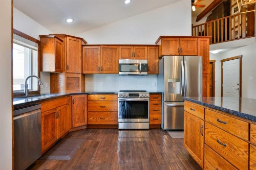 304 S 150 W, Raymond, AB - Indoor Photo Showing Kitchen With Stainless Steel Kitchen