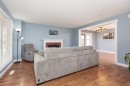 86 Riverstone Boulevard West, Lethbridge, AB  - Indoor Photo Showing Living Room With Fireplace 