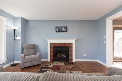 86 Riverstone Boulevard West, Lethbridge, AB - Indoor Photo Showing Living Room With Fireplace