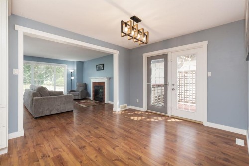 86 Riverstone Boulevard West, Lethbridge, AB - Indoor Photo Showing Living Room With Fireplace