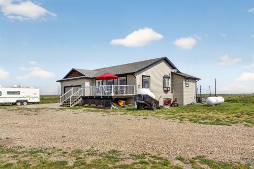 65004 Range Road 19-5, Stirling, AB - Outdoor With Deck Patio Veranda