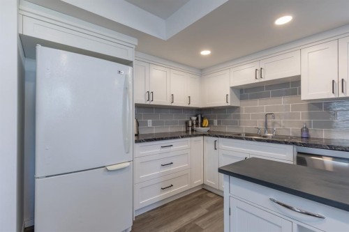 204004 Twp Rd 6-4, Raymond, AB - Indoor Photo Showing Kitchen With Double Sink