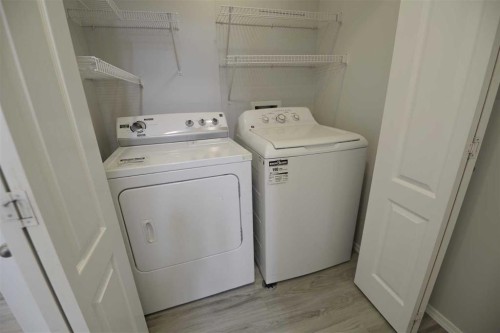 156 Jerry Potts Boulevard West, Lethbridge, AB - Indoor Photo Showing Laundry Room