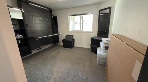 212 Underwood Avenue, Diamond City, AB - Indoor Photo Showing Other Room