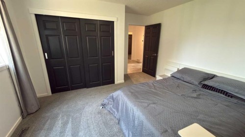 212 Underwood Avenue, Diamond City, AB - Indoor Photo Showing Bedroom