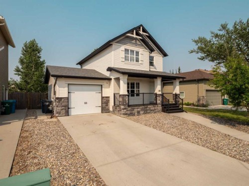 120 Mt Sundial Court West, Lethbridge, AB - Outdoor With Deck Patio Veranda With Facade