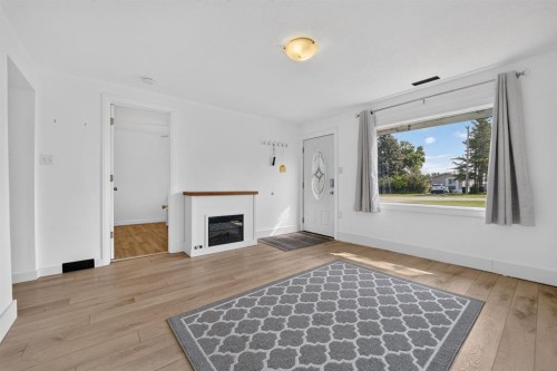 233 4 Street, Stirling, AB - Indoor With Fireplace