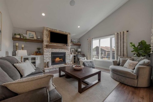 696 Sixmile Crescent South, Lethbridge, AB - Indoor Photo Showing Living Room With Fireplace