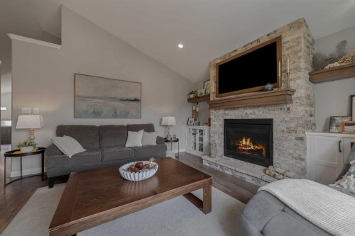 696 Sixmile Crescent South, Lethbridge, AB - Indoor Photo Showing Living Room With Fireplace