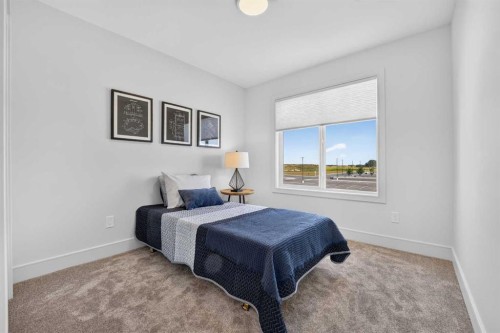 2603 16 Avenue, Coaldale, AB - Indoor Photo Showing Bedroom