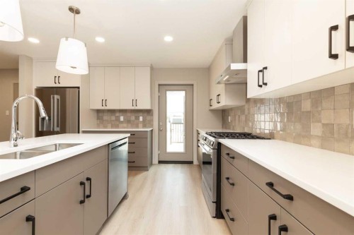 757 Riverhills Landing West, Lethbridge, AB - Indoor Photo Showing Kitchen With Double Sink With Upgraded Kitchen