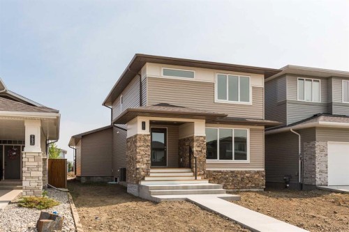 757 Riverhills Landing West, Lethbridge, AB - Outdoor With Facade
