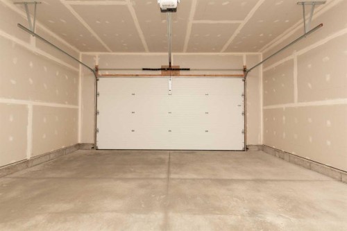 757 Riverhills Landing West, Lethbridge, AB - Indoor Photo Showing Garage