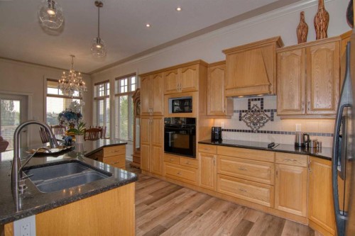 44 Fairmont Point South, Lethbridge, AB - Indoor Photo Showing Kitchen With Double Sink