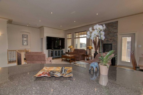 44 Fairmont Point South, Lethbridge, AB - Indoor Photo Showing Living Room With Fireplace