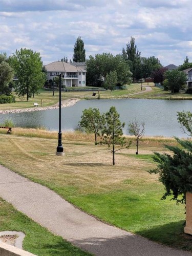 44 Fairmont Point South, Lethbridge, AB - Outdoor With Body Of Water With View