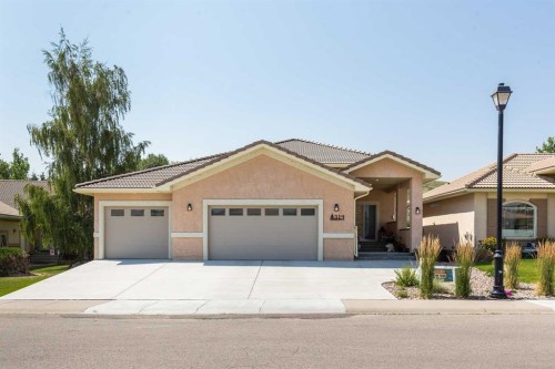 319 Canyon Boulevard West, Lethbridge, AB - Outdoor With Facade