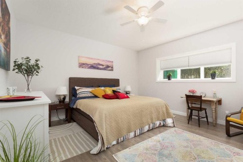 319 Canyon Boulevard West, Lethbridge, AB - Indoor Photo Showing Bedroom