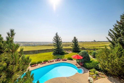 33 Ridgewood Crescent West, Lethbridge, AB - Outdoor With In Ground Pool With View