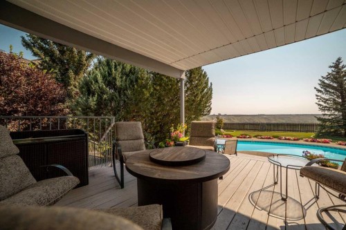 33 Ridgewood Crescent West, Lethbridge, AB - Outdoor With In Ground Pool With Deck Patio Veranda