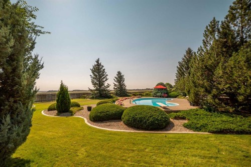 33 Ridgewood Crescent West, Lethbridge, AB - Outdoor With In Ground Pool With View