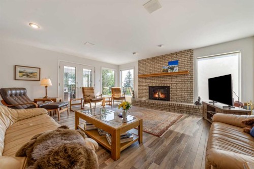 33 Ridgewood Crescent West, Lethbridge, AB - Indoor Photo Showing Living Room With Fireplace