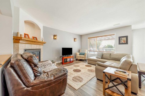 68 Blackfoot Circle West, Lethbridge, AB - Indoor Photo Showing Living Room With Fireplace