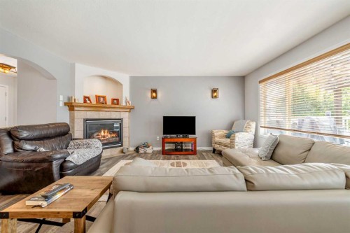 68 Blackfoot Circle West, Lethbridge, AB - Indoor Photo Showing Living Room With Fireplace