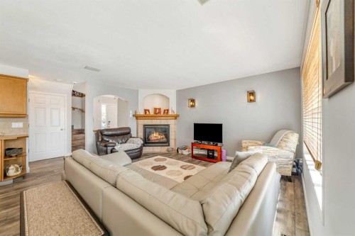68 Blackfoot Circle West, Lethbridge, AB - Indoor Photo Showing Living Room With Fireplace