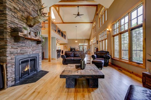2411 63 Street, Coleman, AB - Indoor Photo Showing Living Room With Fireplace