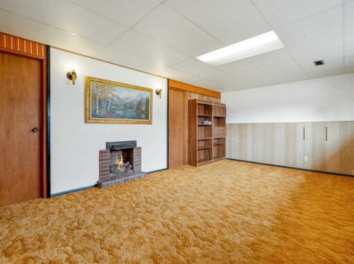 1114 Great Lakes Road South, Lethbridge, AB - Indoor With Fireplace