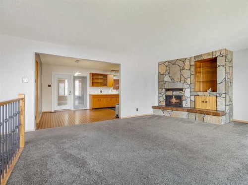 1114 Great Lakes Road South, Lethbridge, AB - Indoor With Fireplace