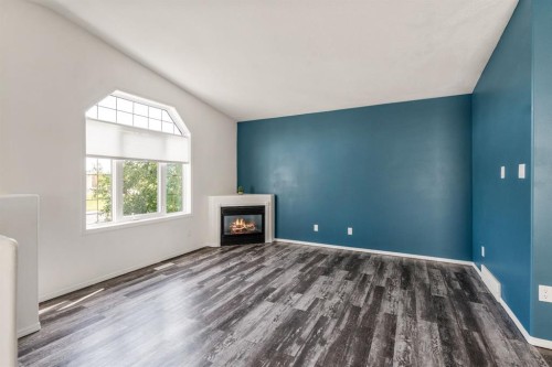 248 Blackfoot Road West, Lethbridge, AB - Indoor Photo Showing Other Room With Fireplace