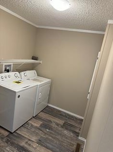 6, 10, 14 Meadows Crescent, Taber, AB - Indoor Photo Showing Laundry Room