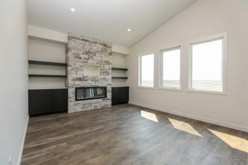 562 Malahat Green West, Lethbridge, AB - Indoor Photo Showing Other Room With Fireplace