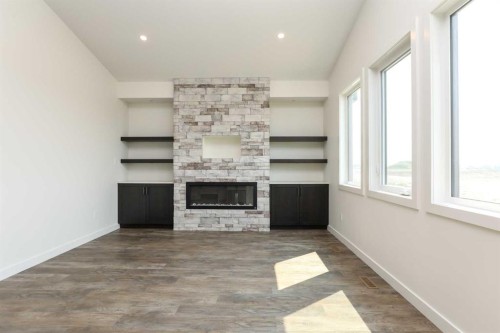 562 Malahat Green West, Lethbridge, AB - Indoor With Fireplace