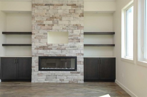 562 Malahat Green West, Lethbridge, AB - Indoor With Fireplace