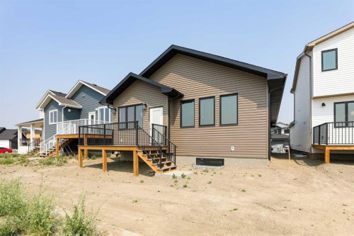 562 Malahat Green West, Lethbridge, AB - Outdoor With Deck Patio Veranda