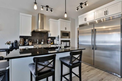 962 Miners Boulevard West, Lethbridge, AB - Indoor Photo Showing Kitchen With Stainless Steel Kitchen With Upgraded Kitchen