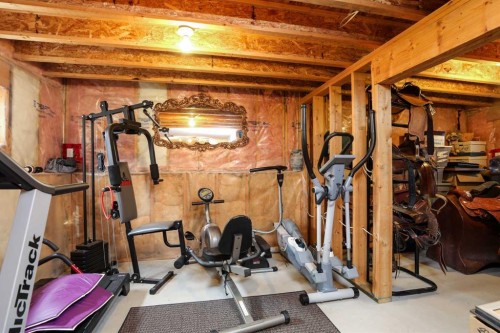 210 Macewan Street, Granum, AB - Indoor Photo Showing Gym Room