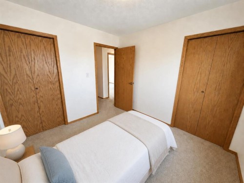 241 Fairway Drive, Coaldale, AB - Indoor Photo Showing Bedroom