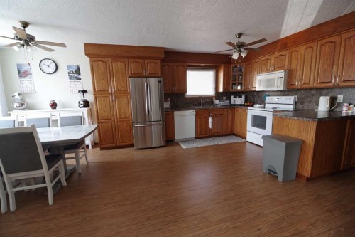 4627 50 Avenue, Taber, AB - Indoor Photo Showing Kitchen With Double Sink