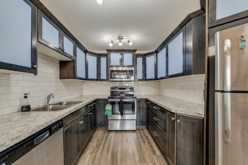 5-103 Crocus Terrace West, Lethbridge, AB - Indoor Photo Showing Kitchen With Stainless Steel Kitchen With Double Sink With Upgraded Kitchen