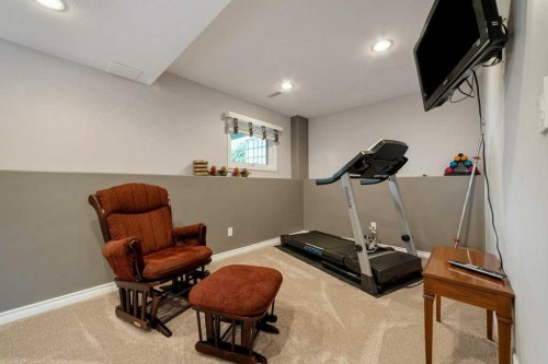 94 Assiniboia Way West, Lethbridge, AB - Indoor Photo Showing Gym Room