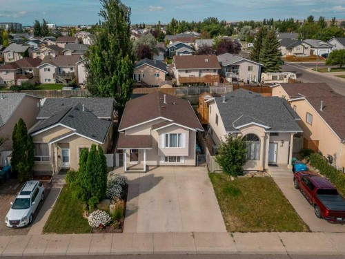 94 Assiniboia Way West, Lethbridge, AB - Outdoor With Facade