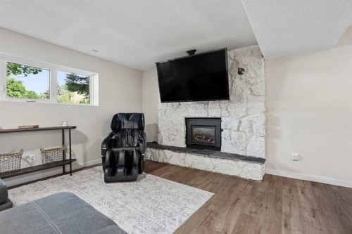 210 Dunkirk Street South, Lethbridge, AB - Indoor Photo Showing Living Room With Fireplace