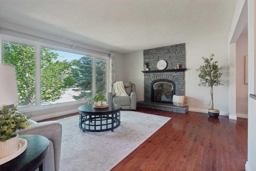 210 Dunkirk Street South, Lethbridge, AB - Indoor Photo Showing Living Room With Fireplace