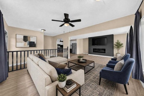 1230 84 Street, Coleman, AB - Indoor Photo Showing Living Room With Fireplace