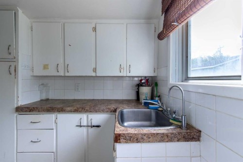 329 12 Street North, Lethbridge, AB - Indoor Photo Showing Kitchen With Double Sink